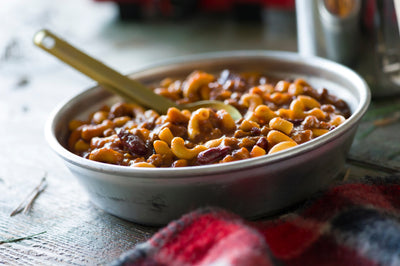 chili mac with beef served in metal plate