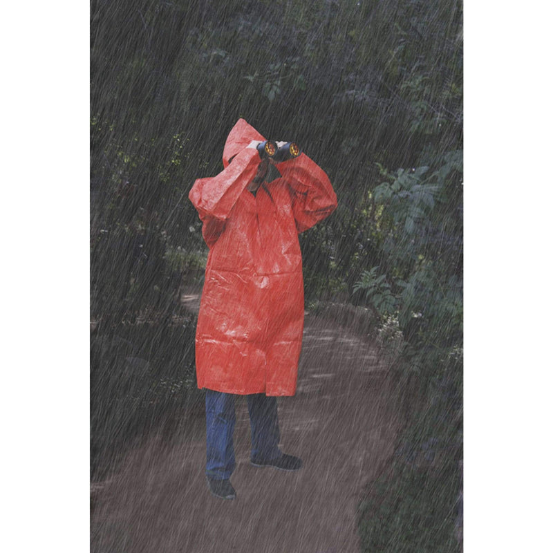 man wearing 5ft Overall Length Aluminum Coated Insulated Poncho in the rain