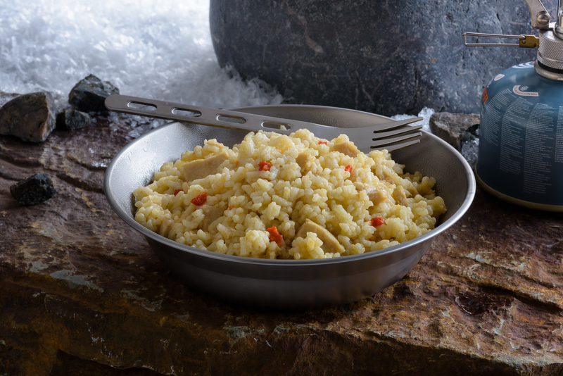 rice and chicken served in metal bowl